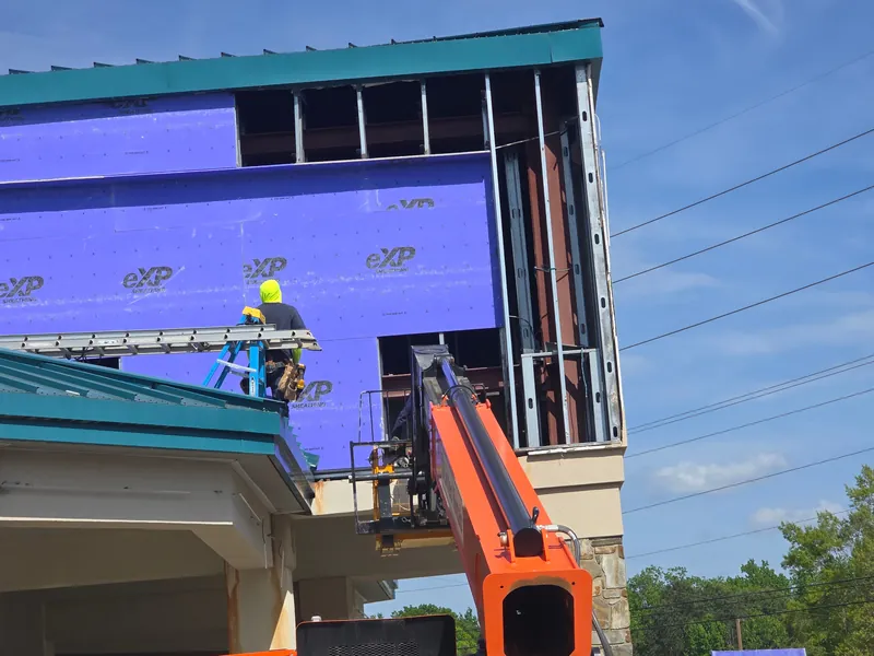 Commercial stucco repair in progress