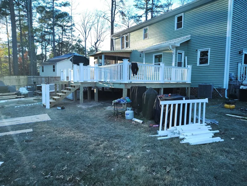 Wide deck with white railings