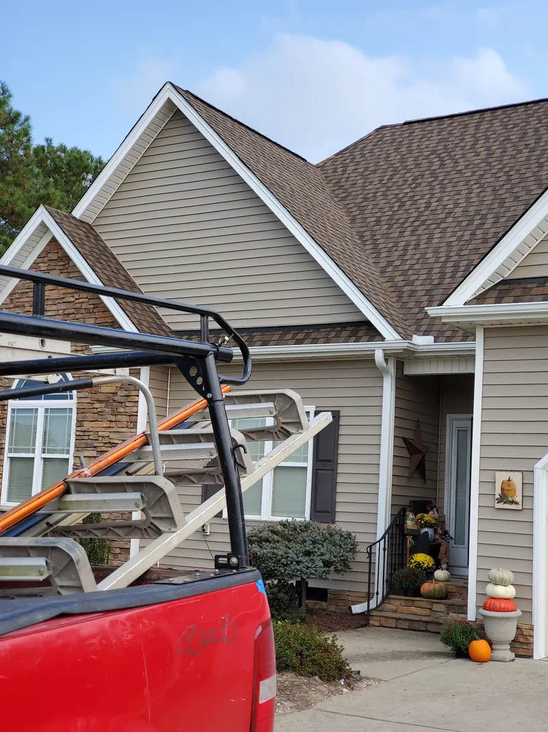 Brown shingle roof replacement